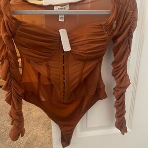 Burnt orange body suit